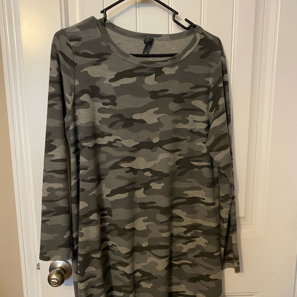 Long sleeve camo dress. Never worn.
